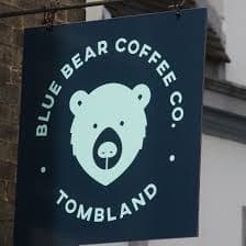 The Blue Bear Coffee Co. hanging sign on Tombland, Norwich.