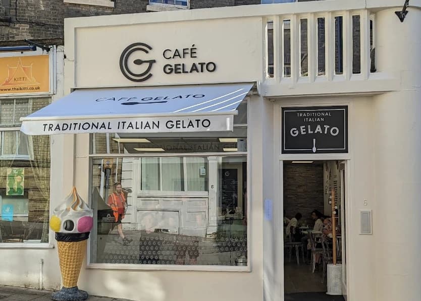 Café Gelato storefront on Opie Street, with the cone mascot outside.